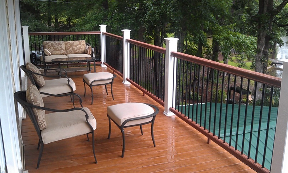 Photo By All American Exteriors. Timbertech Decking, Rails, Stone & Cedar Columns