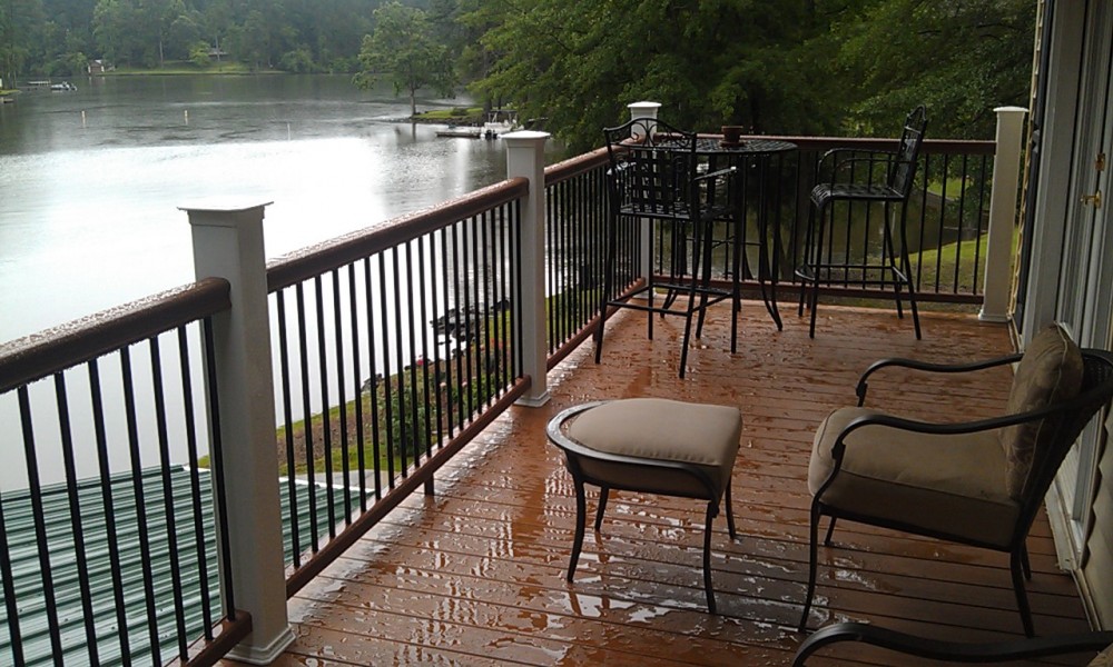 Photo By All American Exteriors. Timbertech Decking, Rails, Stone & Cedar Columns