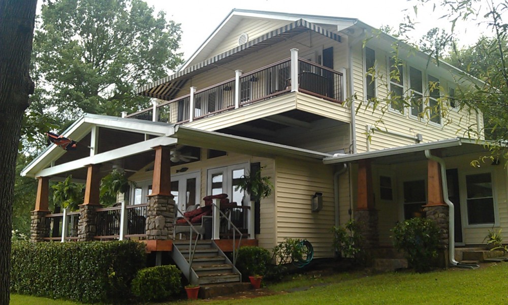 Photo By All American Exteriors. Timbertech Decking, Rails, Stone & Cedar Columns