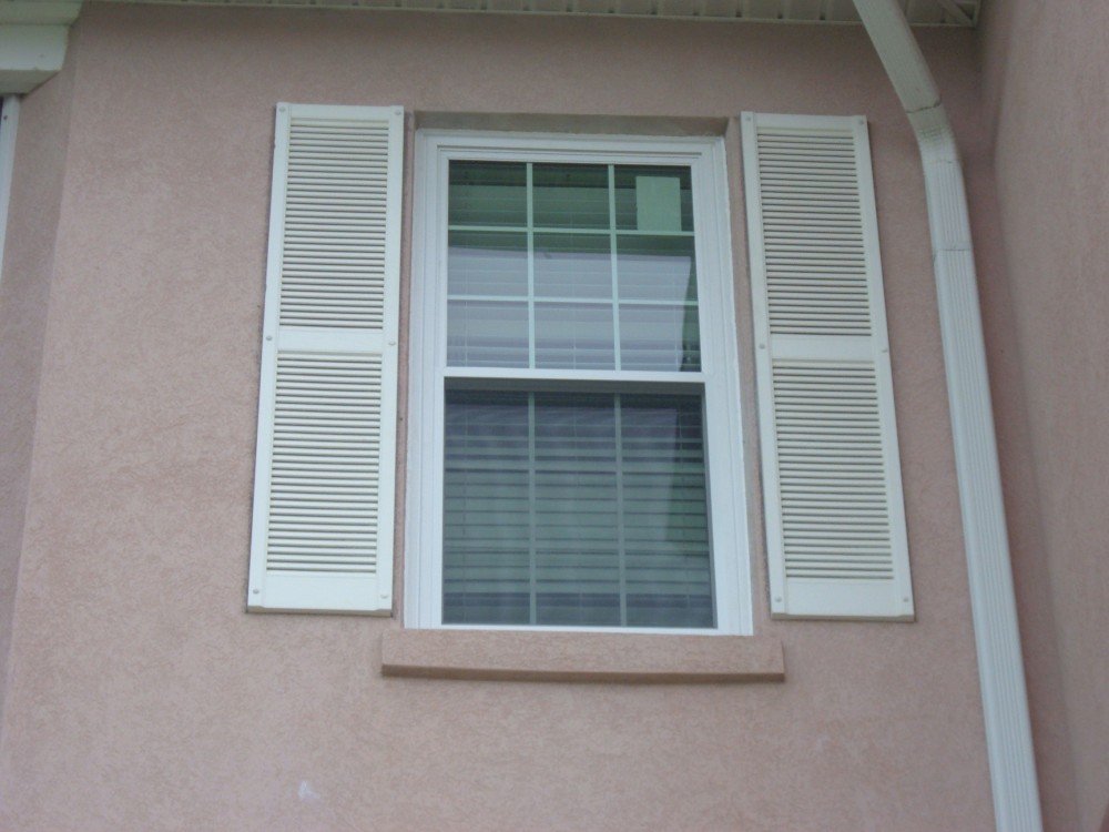 Photo By Siding Industries. HURRICANE IMPACT WINDOWS