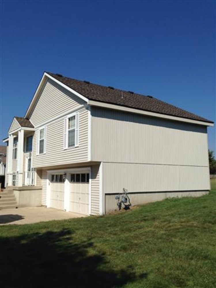 Photo By Integrity Roofing, Siding, Gutters & Windows. 