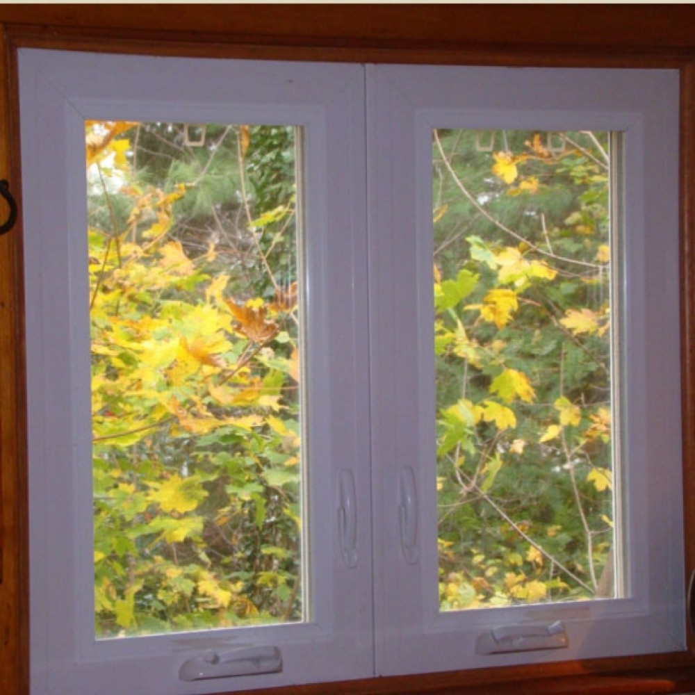 Photo By NEWPRO. NEWPRO Replacement Windows