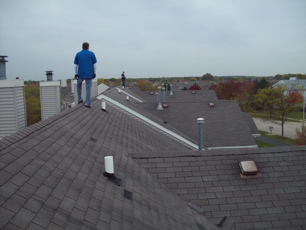 Photo By Hometown Restoration. Red Rock Condominium Association Roofing Project