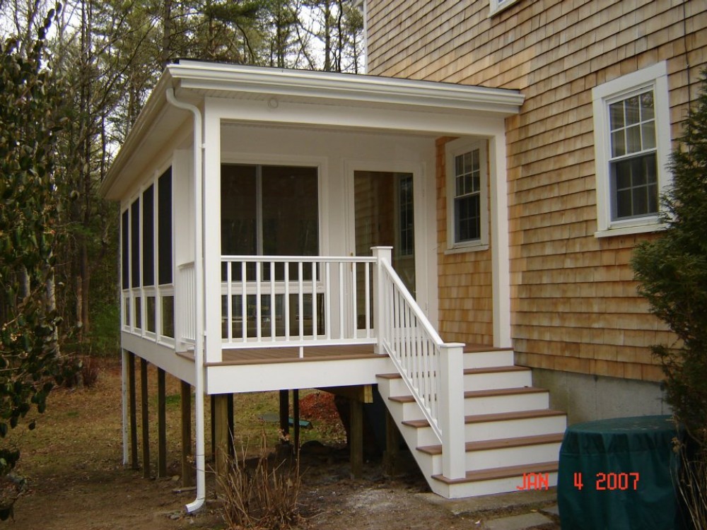 Photo By Care Free Homes Inc.. Sunroom - Before & After