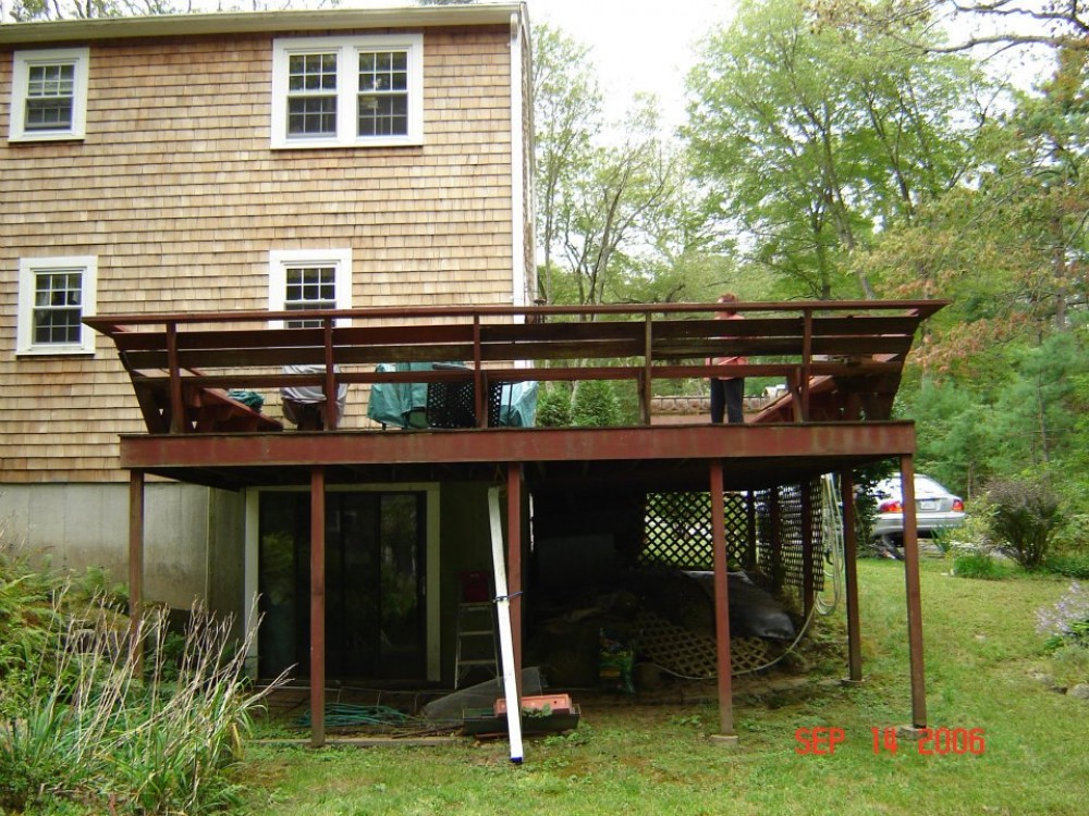 Photo By Care Free Homes Inc.. Sunroom - Before & After