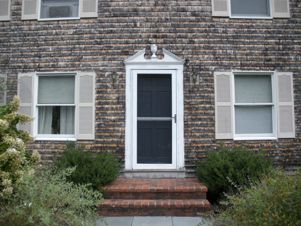 Photo By Care Free Homes Inc.. Vinyl Siding Before & After