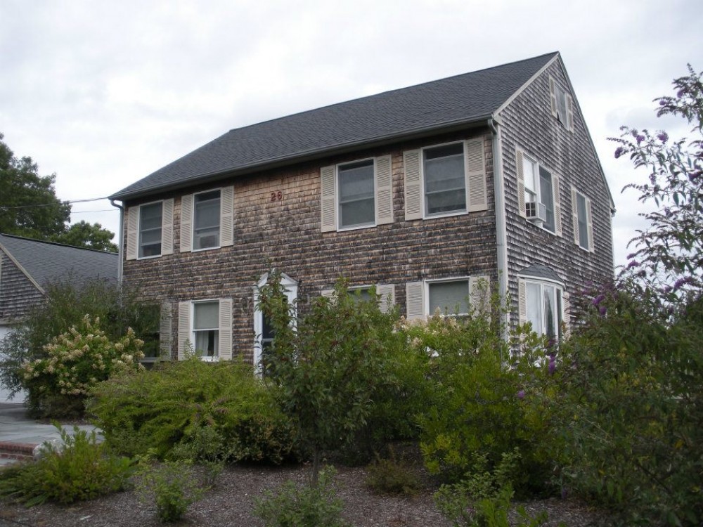 Photo By Care Free Homes Inc.. Vinyl Siding Before & After