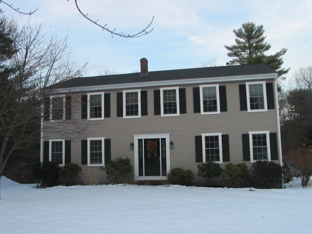 Photo By Care Free Homes Inc.. 3 Car Garage Addition - Before & After