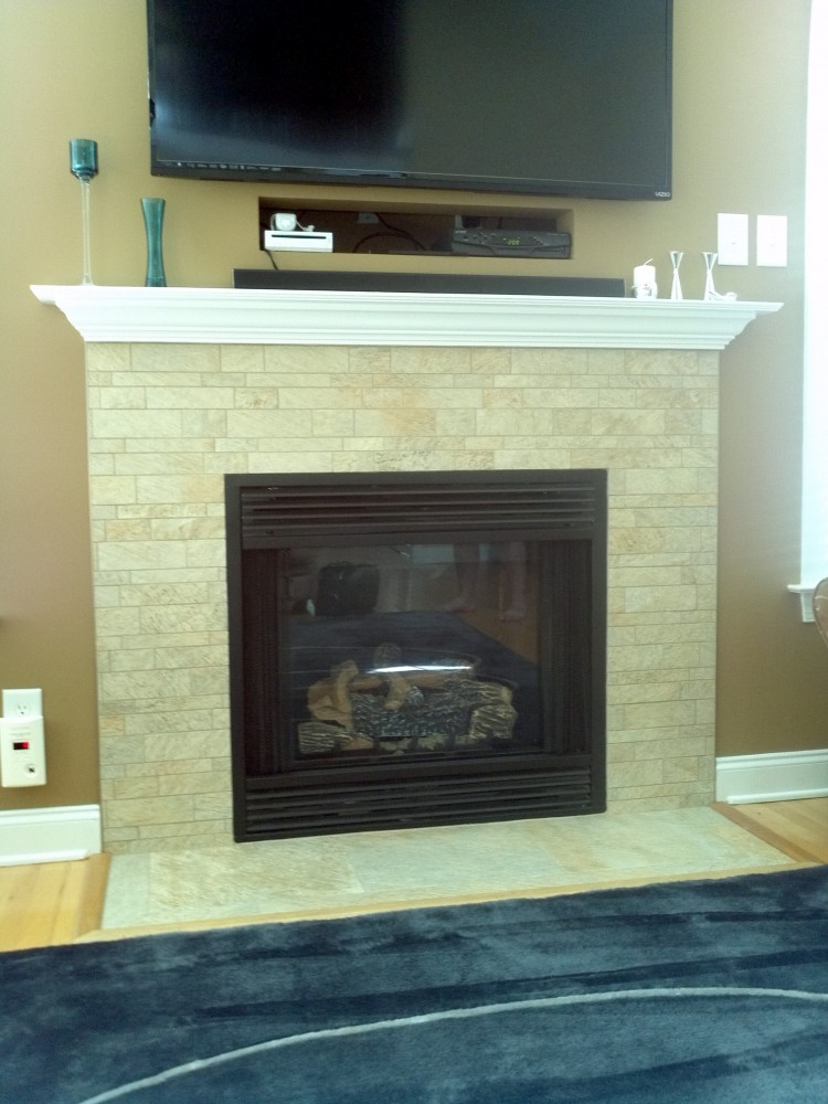 Photo By Quality Design & Construction. Fireplaces