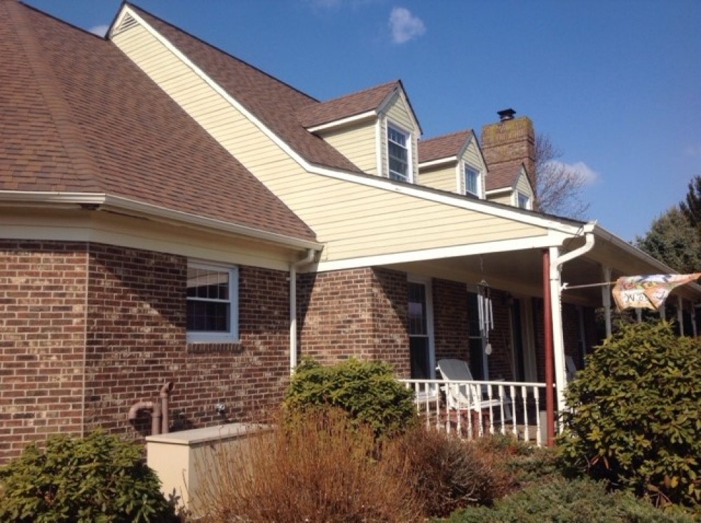 Photo By Custom Concepts Construction. James Hardie Shingle And Lap Siding Mountain Sage & Khaki Brown