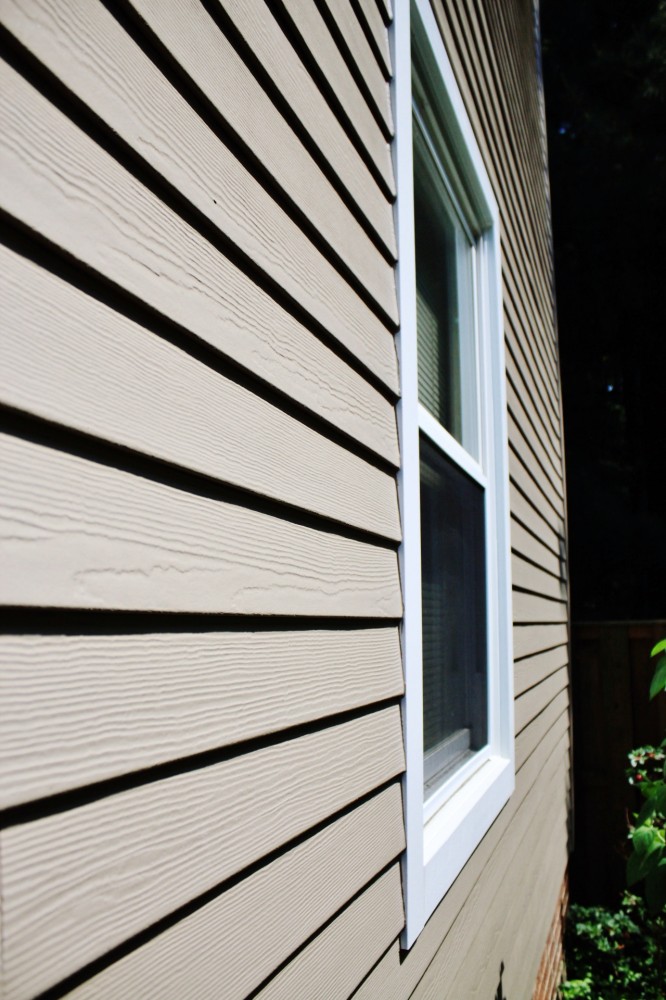 Photo By Custom Concepts Construction. James Hardie Lap Siding Khaki Brown