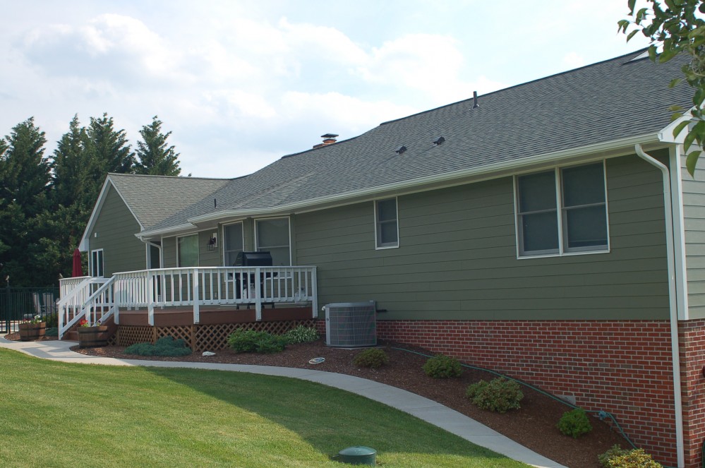 Photo By Custom Concepts Construction. James Hardie Lap Siding Mountain Sage