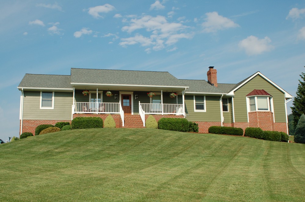 Photo By Custom Concepts Construction. James Hardie Lap Siding Mountain Sage