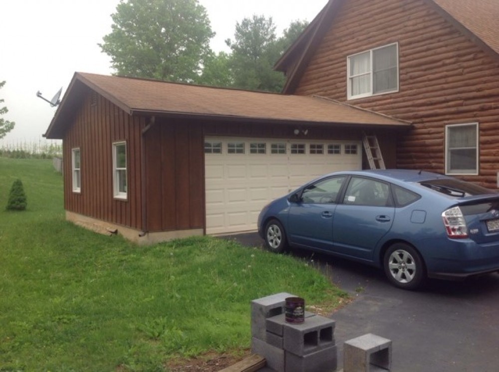 Photo By Custom Concepts Construction. James Hardie Vertical Panel Khaki Brown