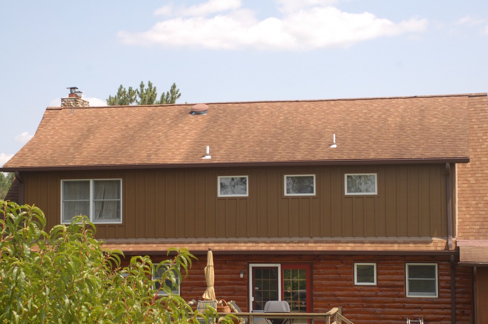 Photo By Custom Concepts Construction. James Hardie Vertical Panel Khaki Brown