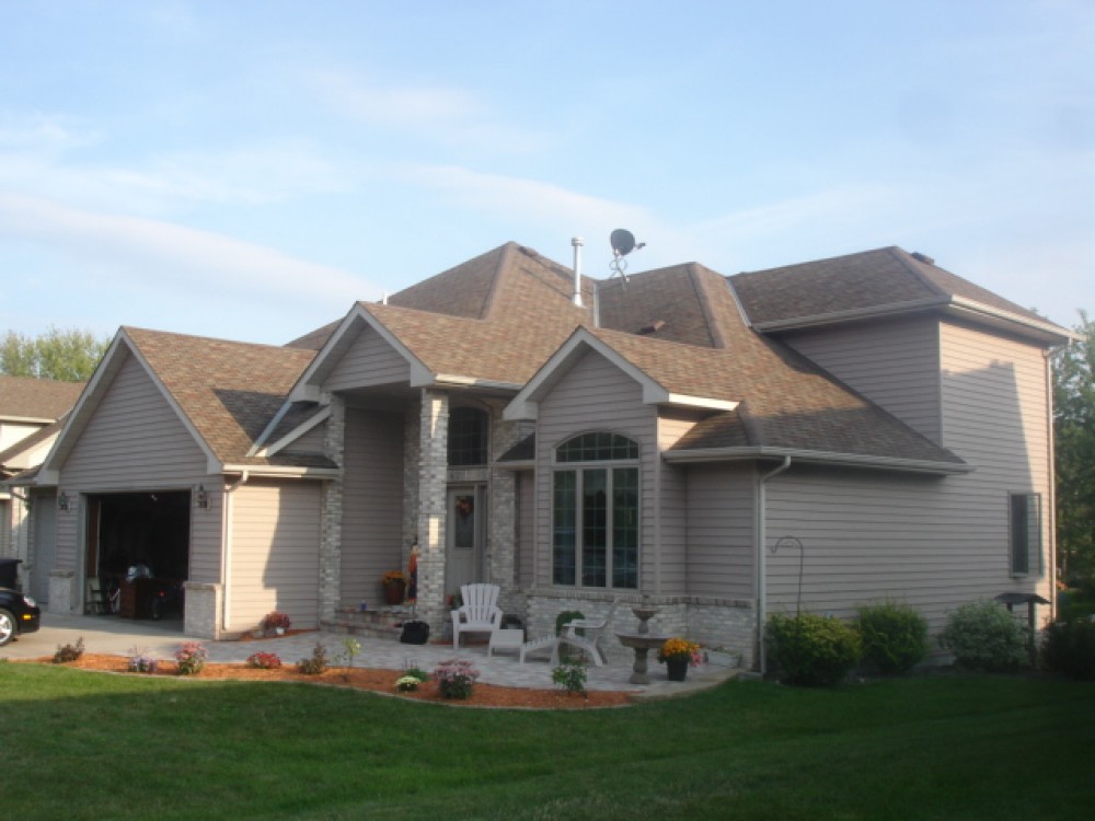 Photo By Craftsman's Choice. James Hardie Siding