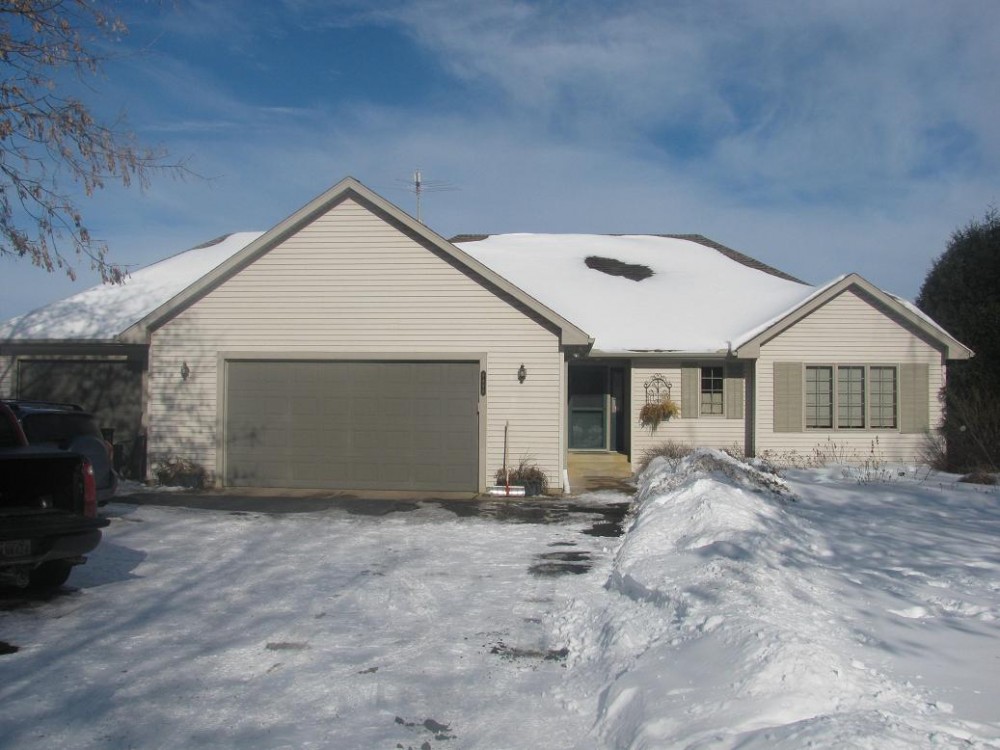 Photo By Craftsman's Choice. James Hardie Siding