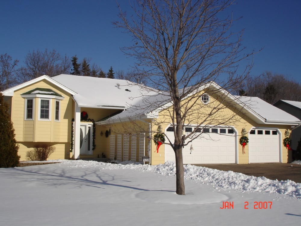 Photo By Craftsman's Choice. James Hardie Siding