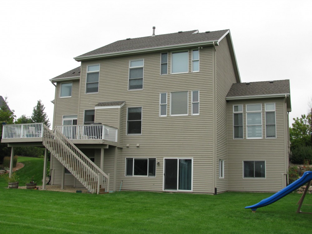 Photo By Craftsman's Choice. Porch & James Hardie Siding