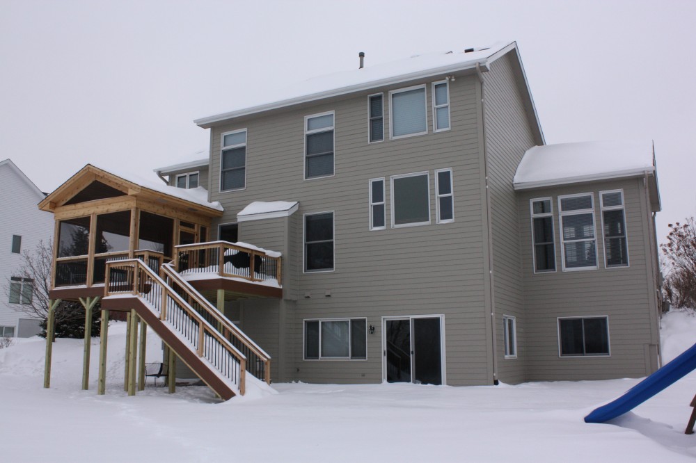 Photo By Craftsman's Choice. Porch & James Hardie Siding