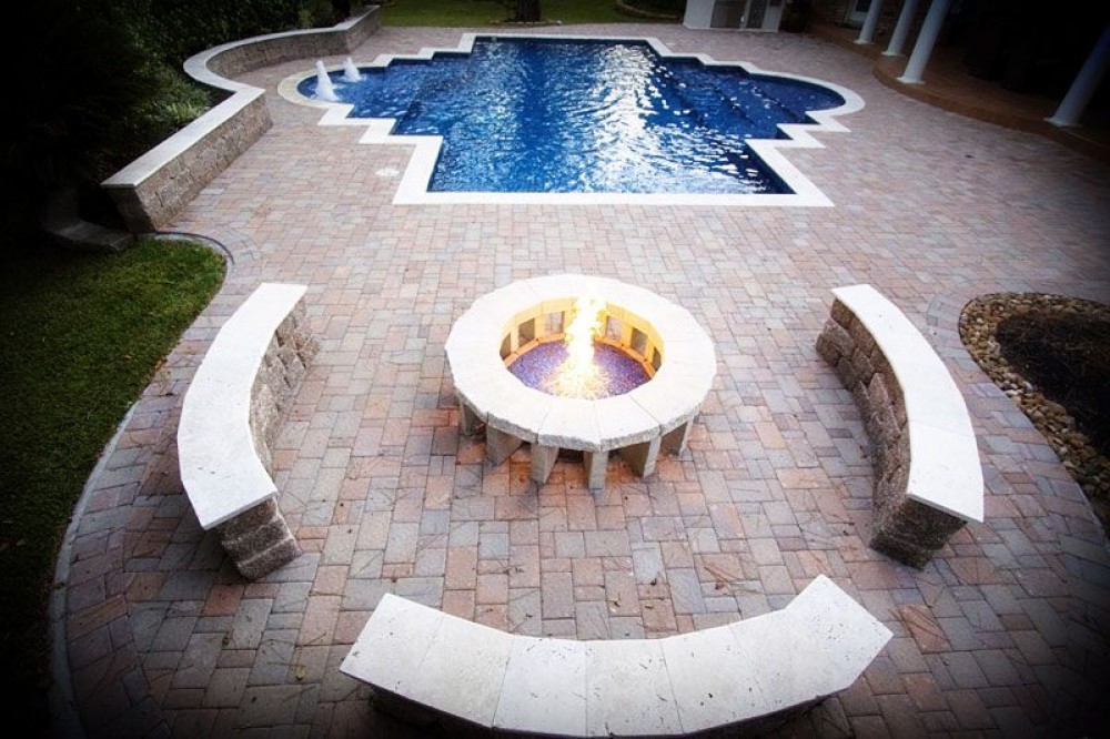 Photo By Elmer's Custom Pools. Stone Seats