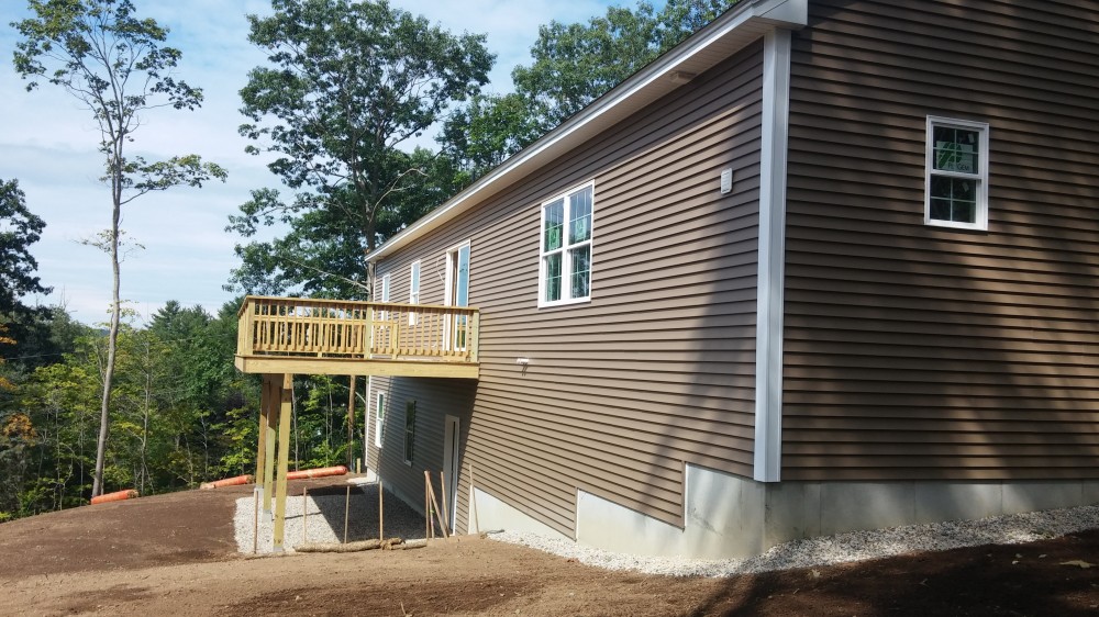 Photo By JAMBCO Construction. Contemporary Ranch