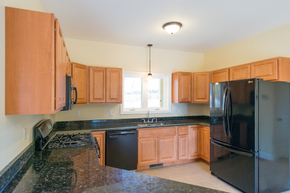 Photo By JAMBCO Construction. Contemporary Ranch