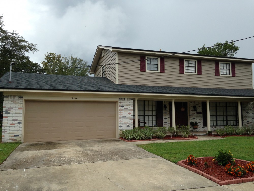 Photo By Siding Industries. Vinyl Siding W Shutters