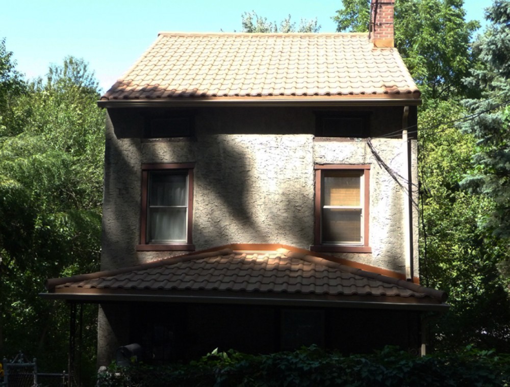 Photo By Global Home Improvement. Metal Shingles