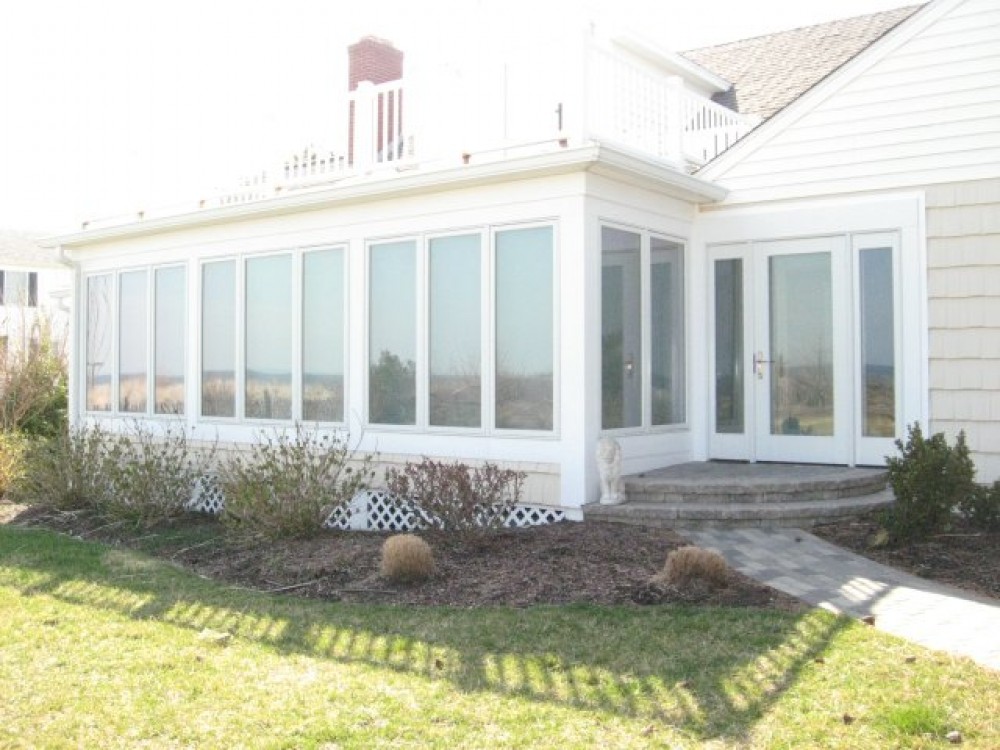Photo By Boardwalk Builders. Sunroom
