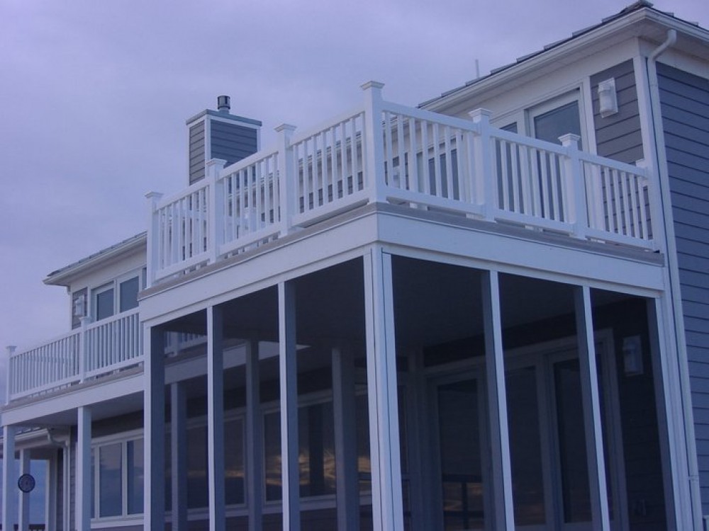 Photo By Boardwalk Builders. Decks & Deck Rails