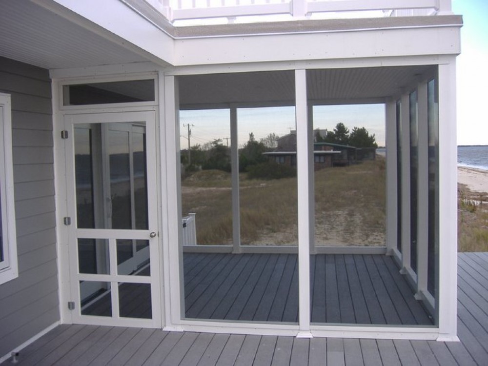 Photo By Boardwalk Builders. Porches