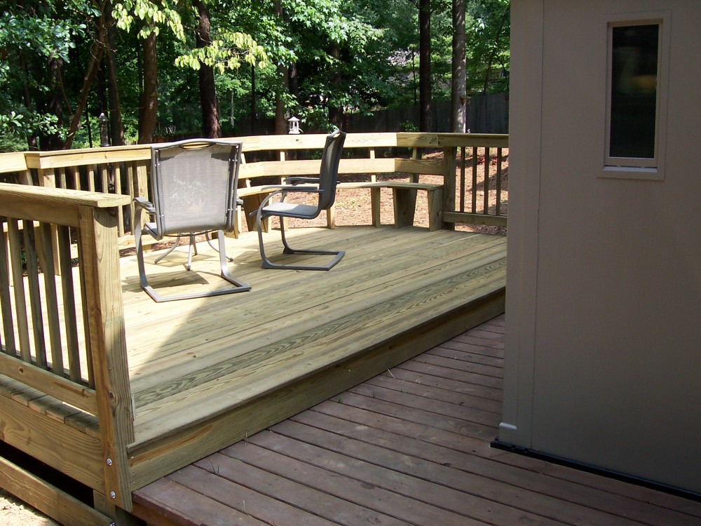 Photo By Verge Painting & Siding. Decks