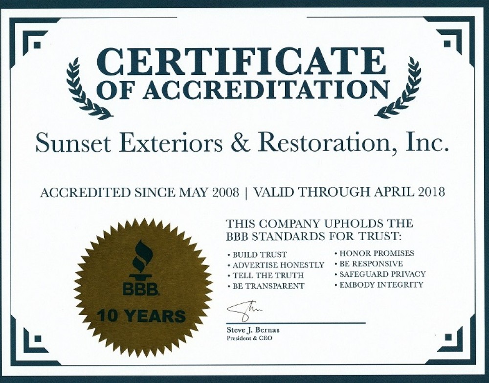 Photo By Sunset Exteriors & Restoration Inc. 