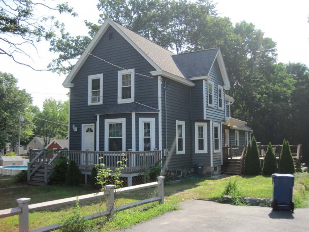 Photo By O'Sullivan Installs. Siding