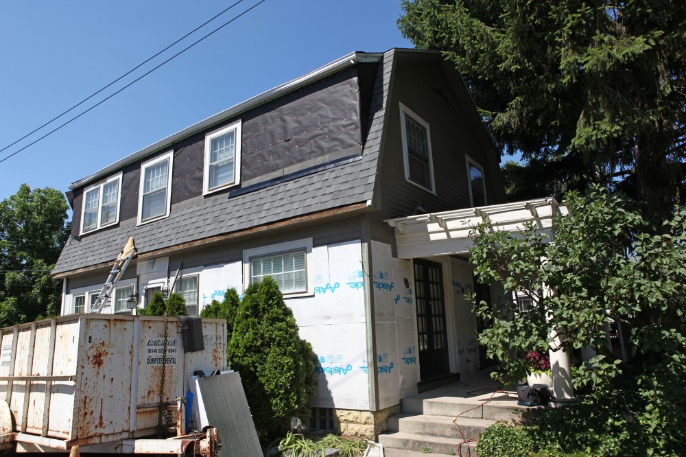 Photo By Ohio Exteriors. Odyssey 4" Clapboard Siding (Storm) With Owens Corning Estate Gray Roofing