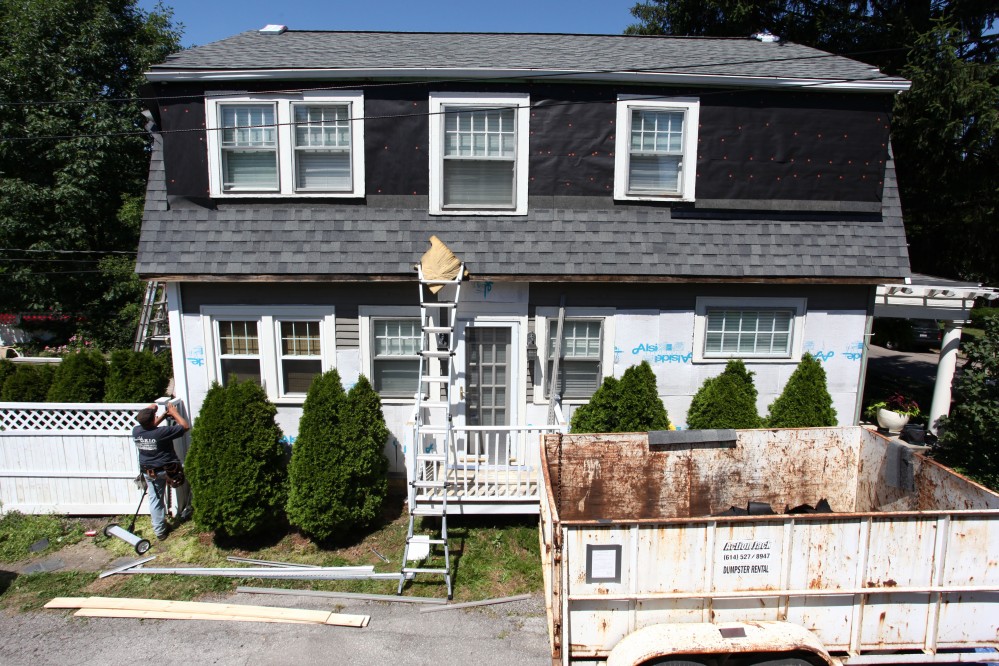 Photo By Ohio Exteriors. Odyssey 4" Clapboard Siding (Storm) With Owens Corning Estate Gray Roofing