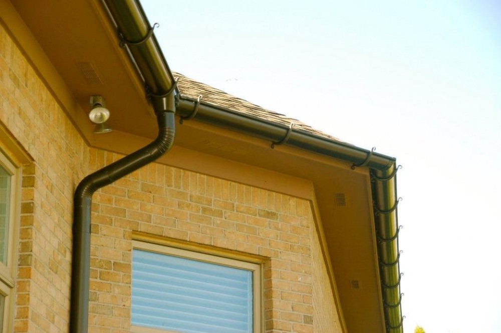 Photo By GREAT LAKES GUTTER. Half-Round Seamless Gutter