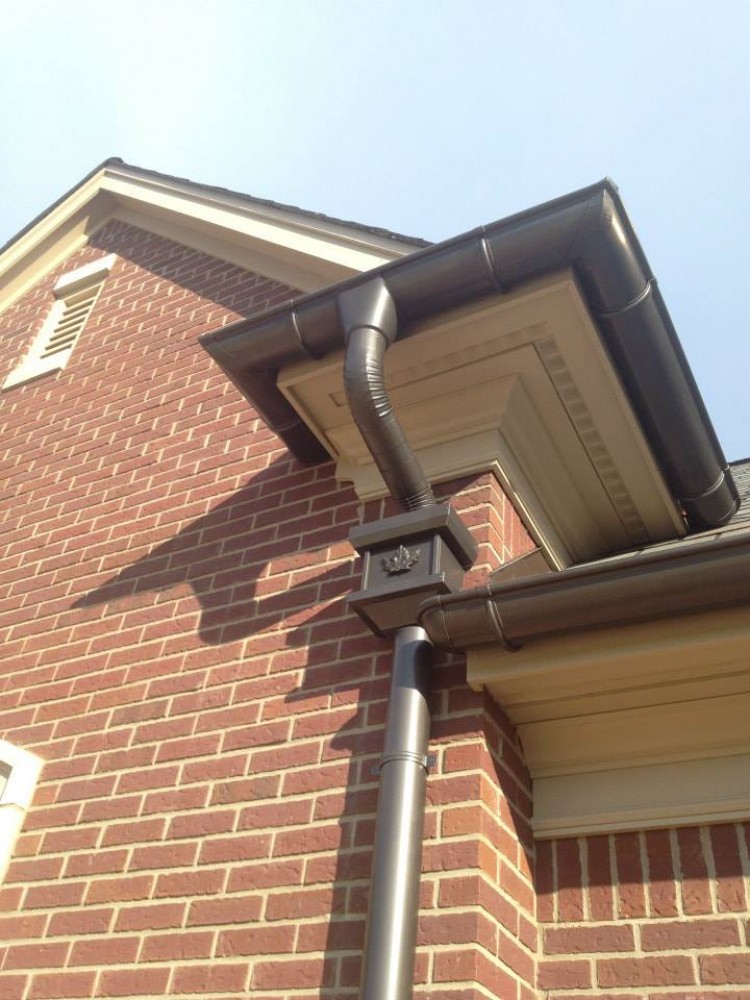 Photo By GREAT LAKES GUTTER. Half-Round Seamless Gutter