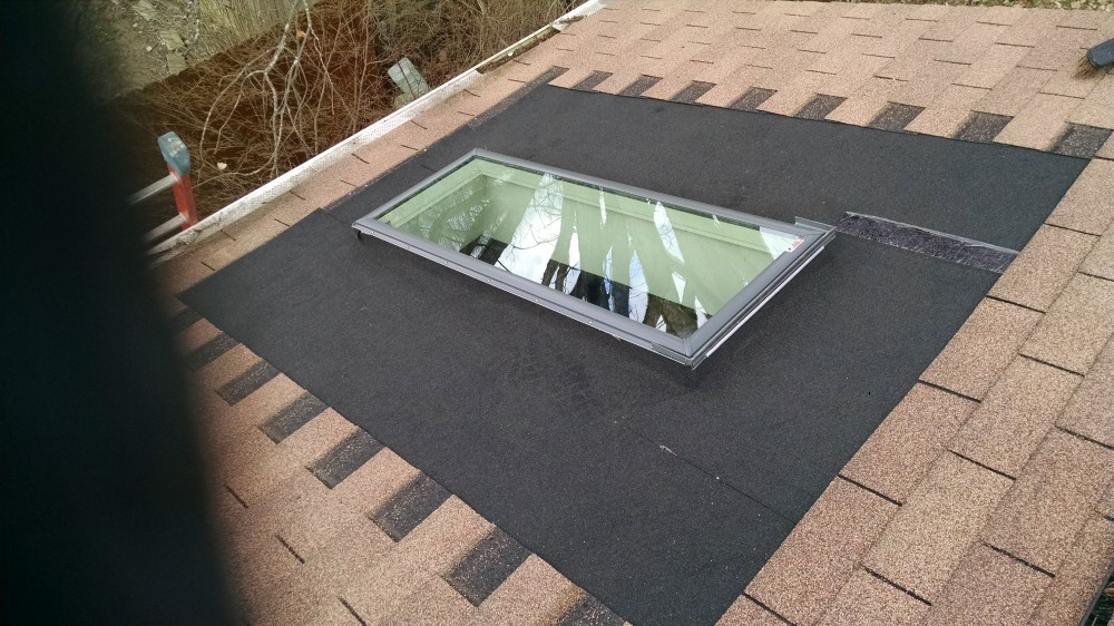 Photo By Ohio Exteriors. New Velux C08 Skylights