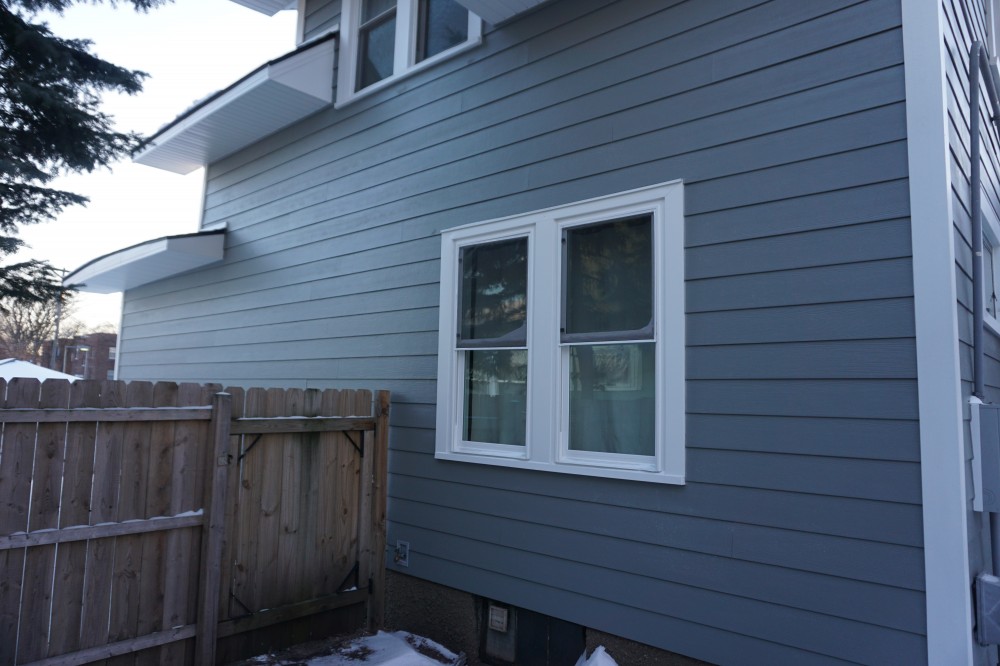 Photo By Storm Group Roofing, LLC. James Hardie Siding Installation