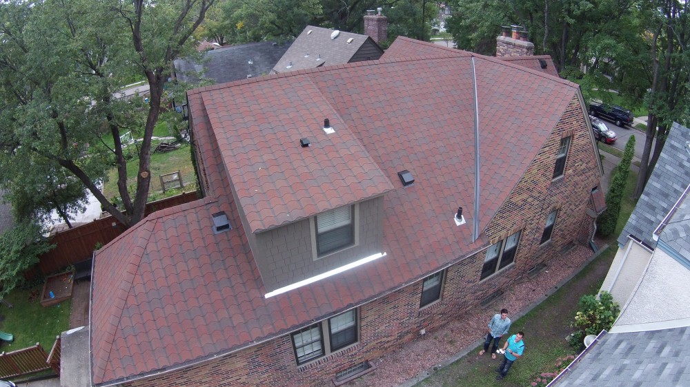 Photo By Storm Group Roofing, LLC. GAF "Designers" Collection Roof. Style: "Monaco", Color: "Valencia Sunset