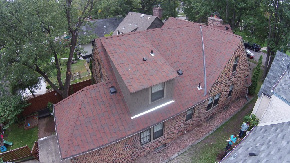 Photo By Storm Group Roofing, LLC. GAF "Designers" Collection Roof. Style: "Monaco", Color: "Valencia Sunset