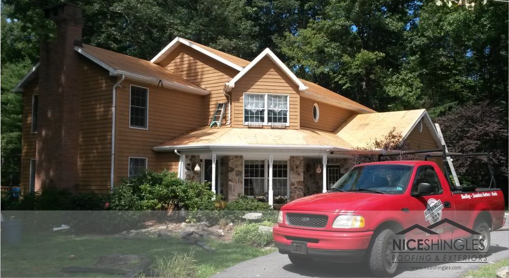 Photo By Nice Shingles Roofing & Exteriors. Roof Replacement