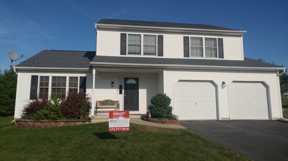 Photo By Nice Shingles Roofing & Exteriors. Roof Replacement