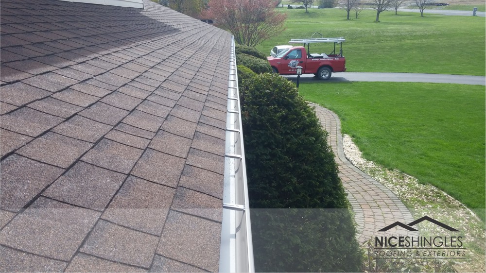 Photo By Nice Shingles Roofing & Exteriors. Roof Replacement