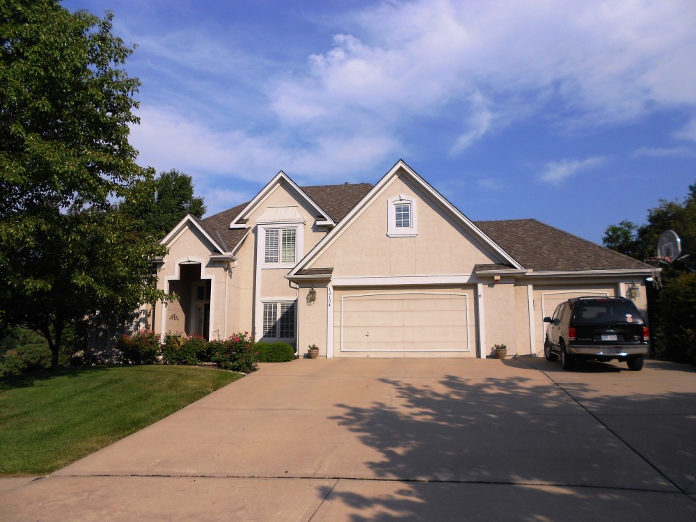 Photo By Johnson County Siding & Window Co.. Before & After Gallery