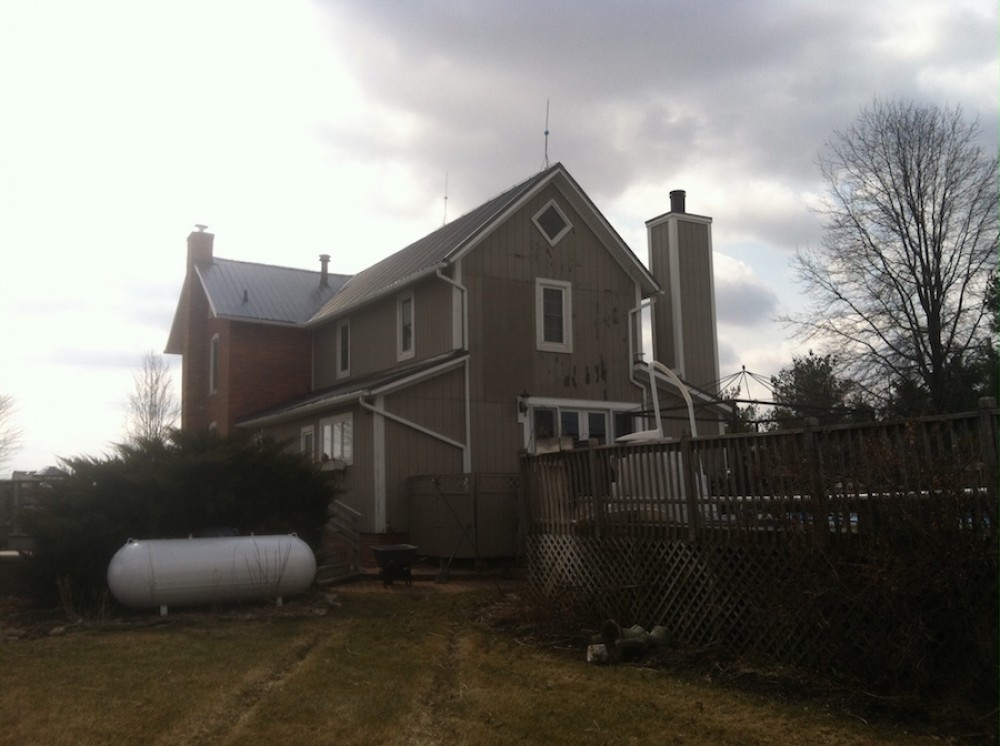 Photo By Ohio Exteriors. Mastic Board & Batten Vinyl Siding In Harbor Gray 