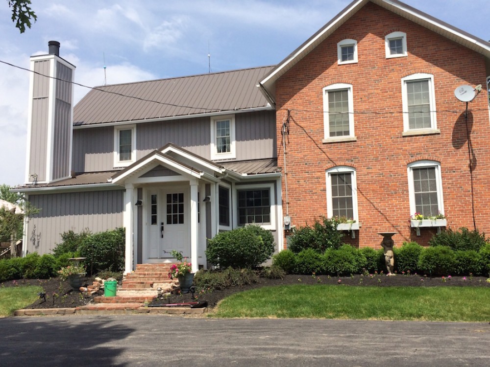 Photo By Ohio Exteriors. Mastic Board & Batten Vinyl Siding In Harbor Gray 