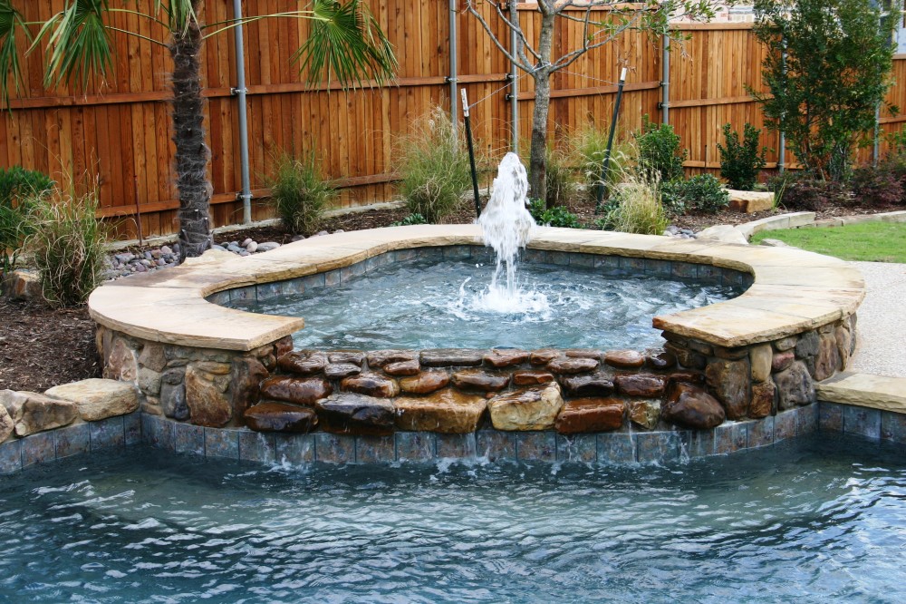 Photo By Gold Medal Pools & Outdoor Living. Spas
